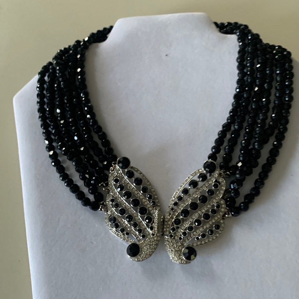 14 inch-6 strands black jet necklace - ornament 2-1/2 H x 2-1/2 W when closed.
